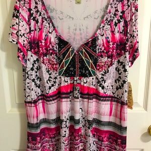 This is a New, With tags, One World ladies top